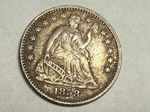 1858 SEATED LIBERTY silver U.S. half dime. XF. #ur3