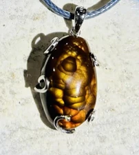 Fire agate pendant, Deer Creek AZ .6”X 1” 12 Ct. Set In Silver Plated Brass