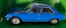 Peugeot 504 1975 in blue, 1:24 scale diecast car model from Welly, 24001B