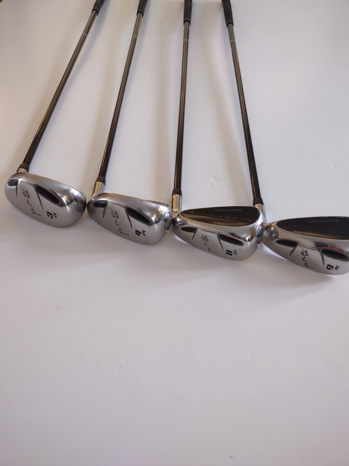 4 PineMeadow Hybrid Pre SS Clubs, 3 4 8 and 9 used in very good condition 