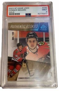2023-24 UD SP Game Used Authentic Rookies Gold Connor Bedard 063/123 PSA 9