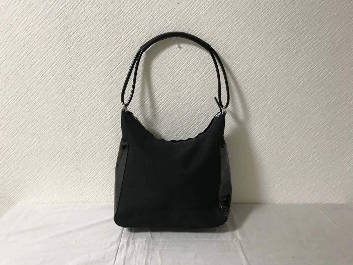 Sac à main bandoulière Gucci cuir toile noir