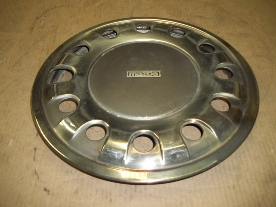 83 84 85 86 Mazda GLC 1983 tapacubos llanta tapacubos 13" fabricante de equipos originales usado 56508 Foto 2 de 4