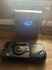 Sega Genesis Model 1 Console w/ Sega CD 2 Bundle. Console Works, CD Untested.