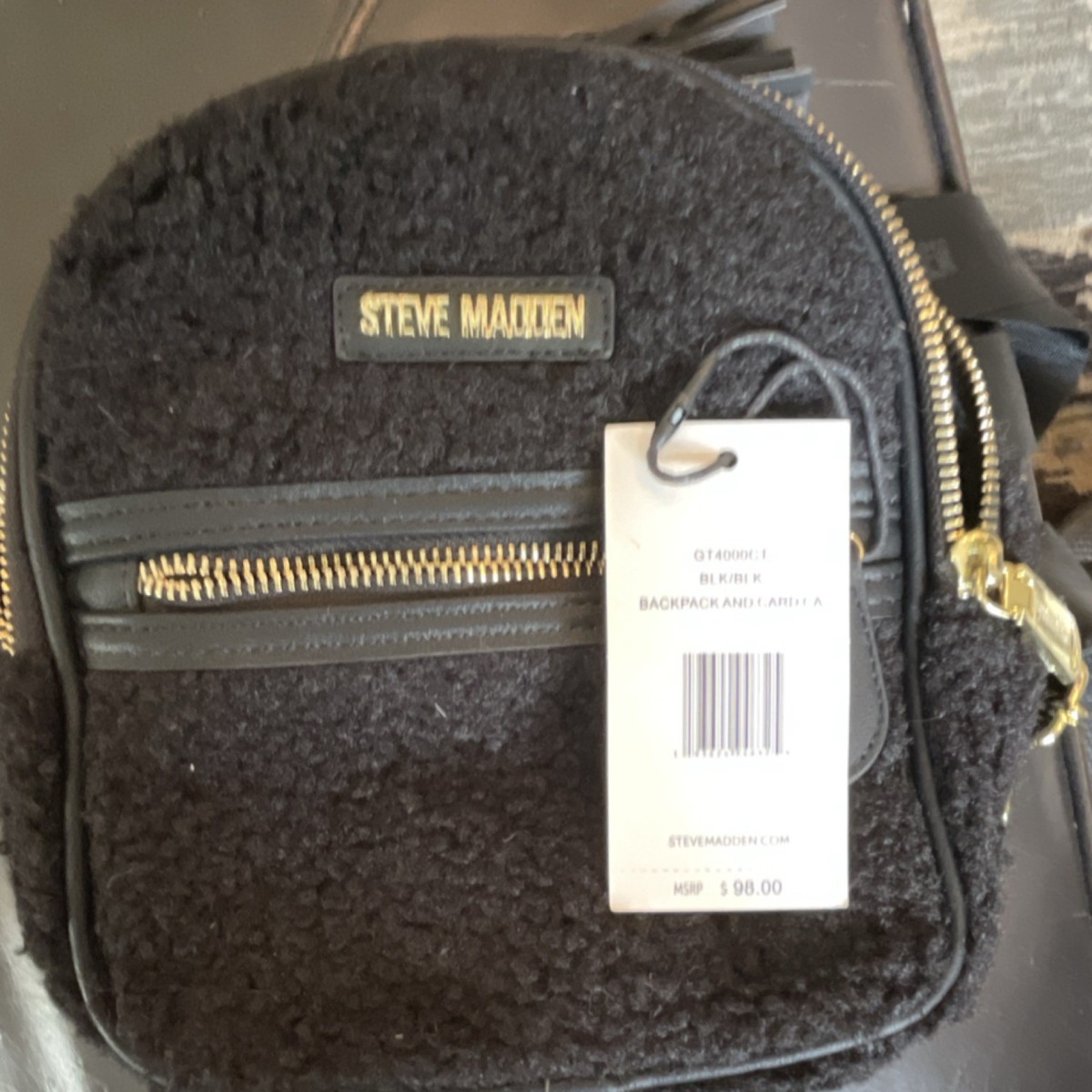 Steve Madden Black Faux Shearling Backpack with Tassel  display picture 1