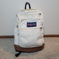 Mochila JanSport de tela lisa blanca/marrón/negra acolchada bolsillo botella cremallera