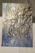An original blue watercolor abstractionwithblackbranchesandgoldandsilverleaves.