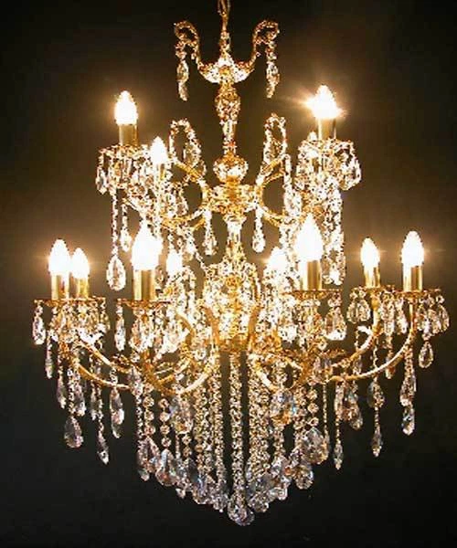 Large chandelier with 12 lights 3 floors real crystals. Gold or