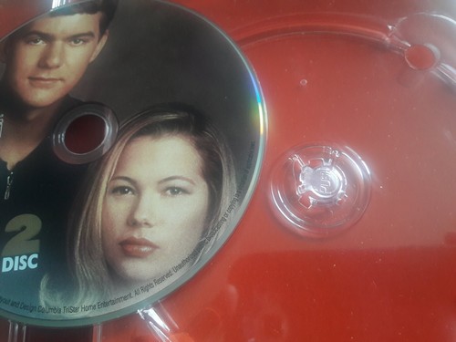 Red DVD case for Dawsons Creek, 2003 3-disc set, with holographic cover and imprinted warning text.
