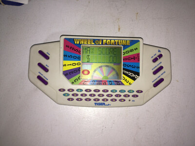 Vintage (1995)  Tiger Electronics Wheel of Fortune Handheld Game w/ Cartridge
