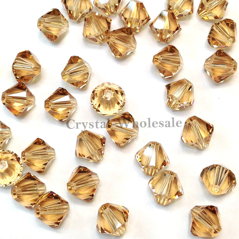 12 Swarovski 5328 XILION Crystal Bicone Beads 8mm gold LIGHT COLORADO TOPAZ  246