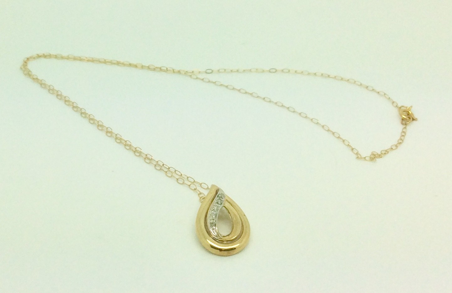 9ct gold pendant set with Diamonds & 16” chain 9ct gold pendant set with Diamonds & 16” chain