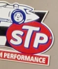 vintage stp 12in porcelain sign