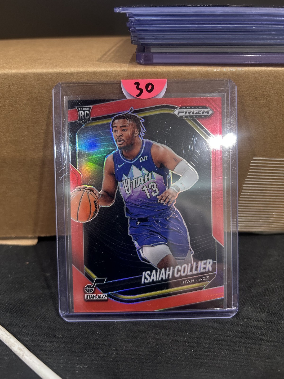 2024-25 Panini Prizm Black Isaiah Collier #32 Red Prizm /299 (RC)