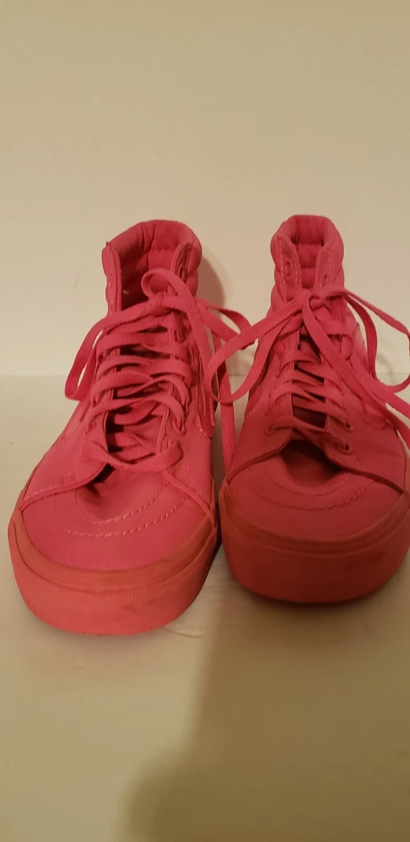 Bright pink top high top vans