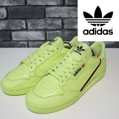 neon yellow adidas sneakers
