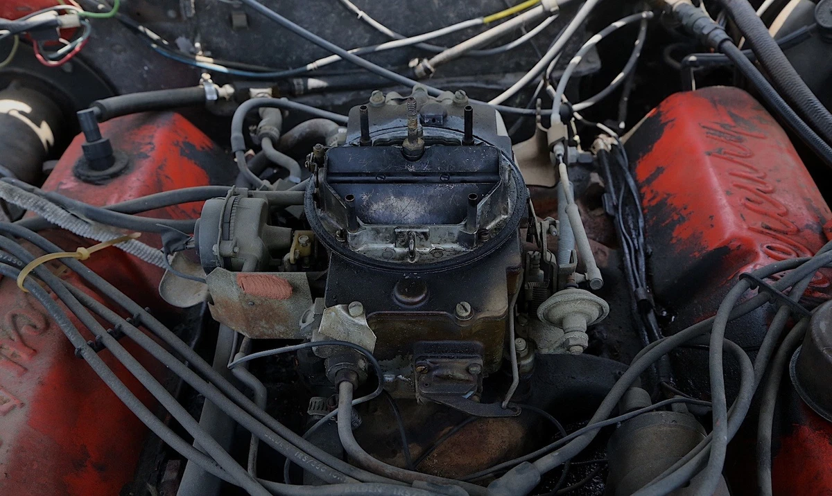 This 1965 Mercury Park Lane's carburetor desperately needs to be cleaned.
