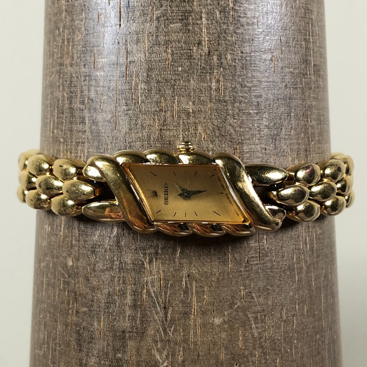 Vintage Seiko Women 2E20-7329 Dress Gold Dial Asymmetrical Quartz