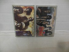 LOT OF 2 cassettes by THE TRAVELING WILBURY'S exc cond. VOL 1  VOL. 3