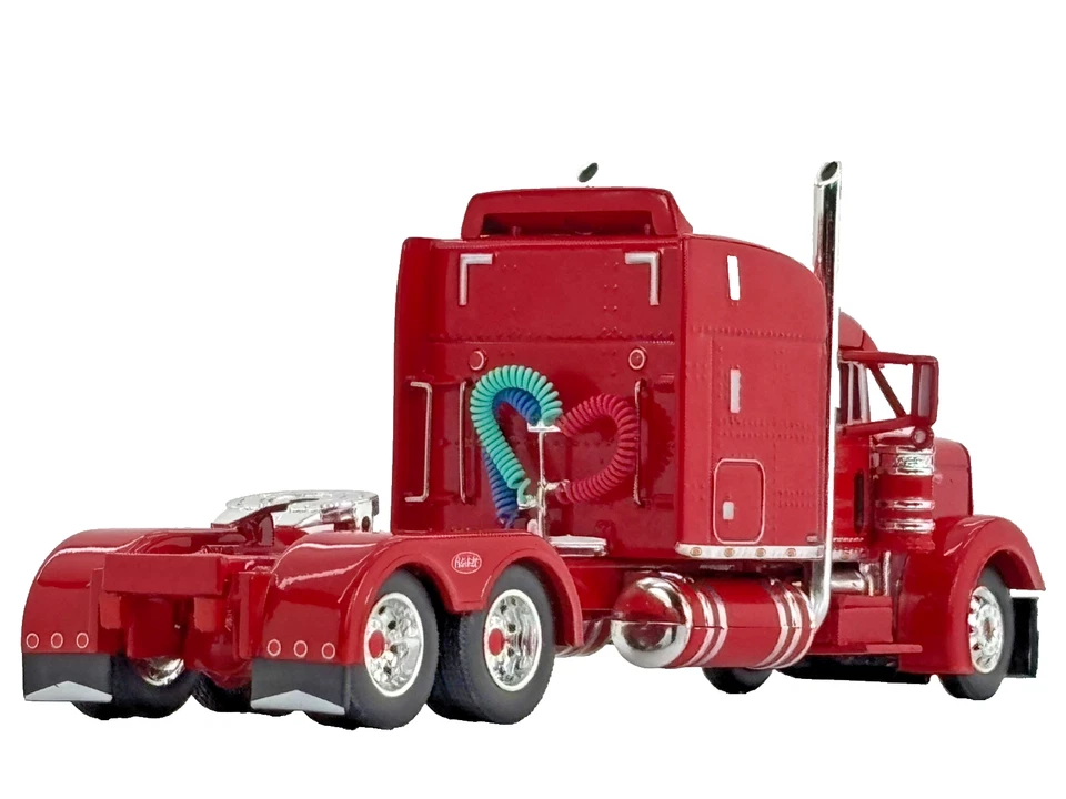 1/64 DCP RED PETERBILT 379 W/ 63" MID ROOF SLEEPER W/ WHALE TAIL - Image 2 of 4