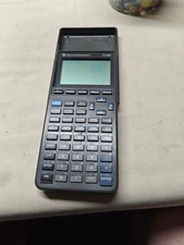 Texas Instruments TI-82 Graphing Calculator Gray With Cover