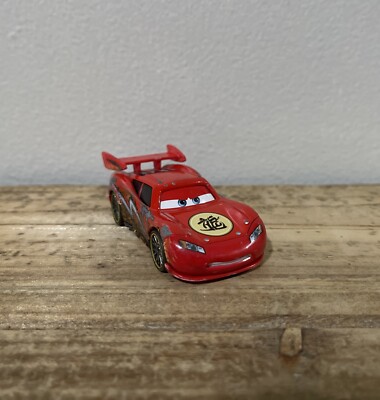 Mattel Disney Pixar Cars Toon Dragon Lightning McQueen With Oil Stains