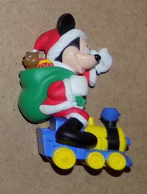 Mickey Mouse as Santa with Sack of Presents Riding on a Train Christmas Ornament
