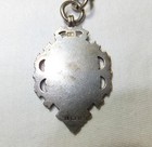 VINTAGE ANTIQUE BRITISH SILVER POCKETWATCH FOB WITH STAMPED CREST CHARM — photo 9