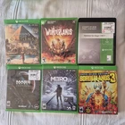 6 XBOX ONE GAMES-WONDERLANDS, CREED ORIGINS, METRO EXODUS. BORDERLANDS 3, MASS E