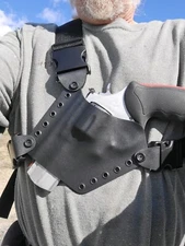 taurus 44 mag chest holster/tracker/ 5 shot