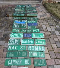 Street name signs pICK ONE. Approximately 18  inch and smaller in length