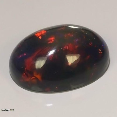 6.11CTS  NATURAL COLOR PLAY OPAL OVAL SHAPE LOOSE GEMSTONE FROM ETHIOPIA