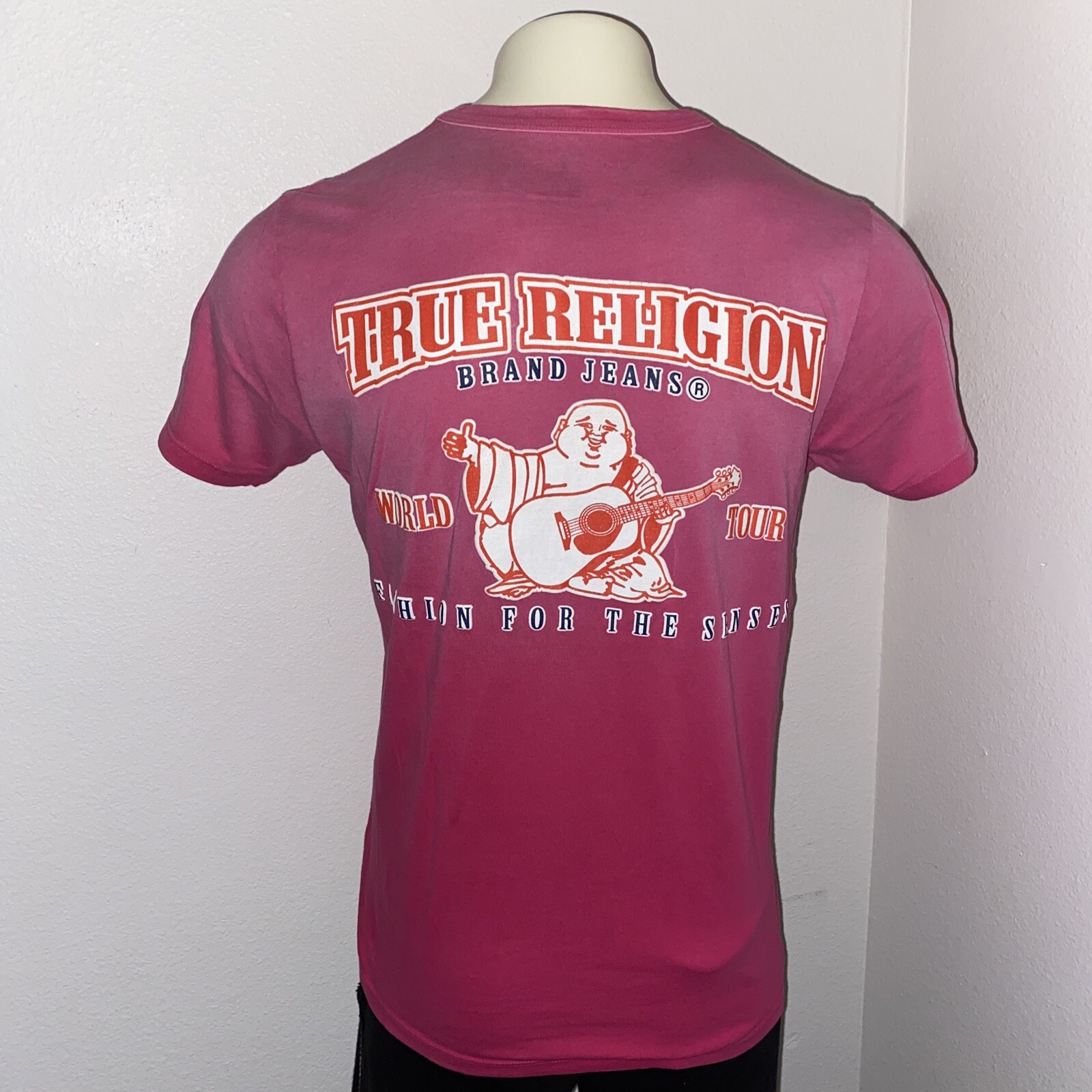 pink and white true religion shirt