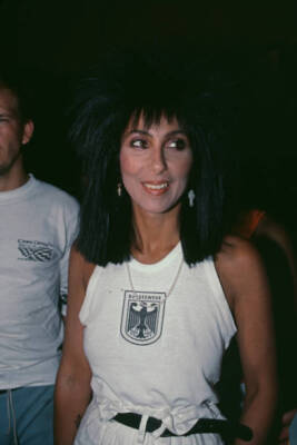 singer actress Cher wearing a white vest the Bundeswehr crest atte- Old Photo