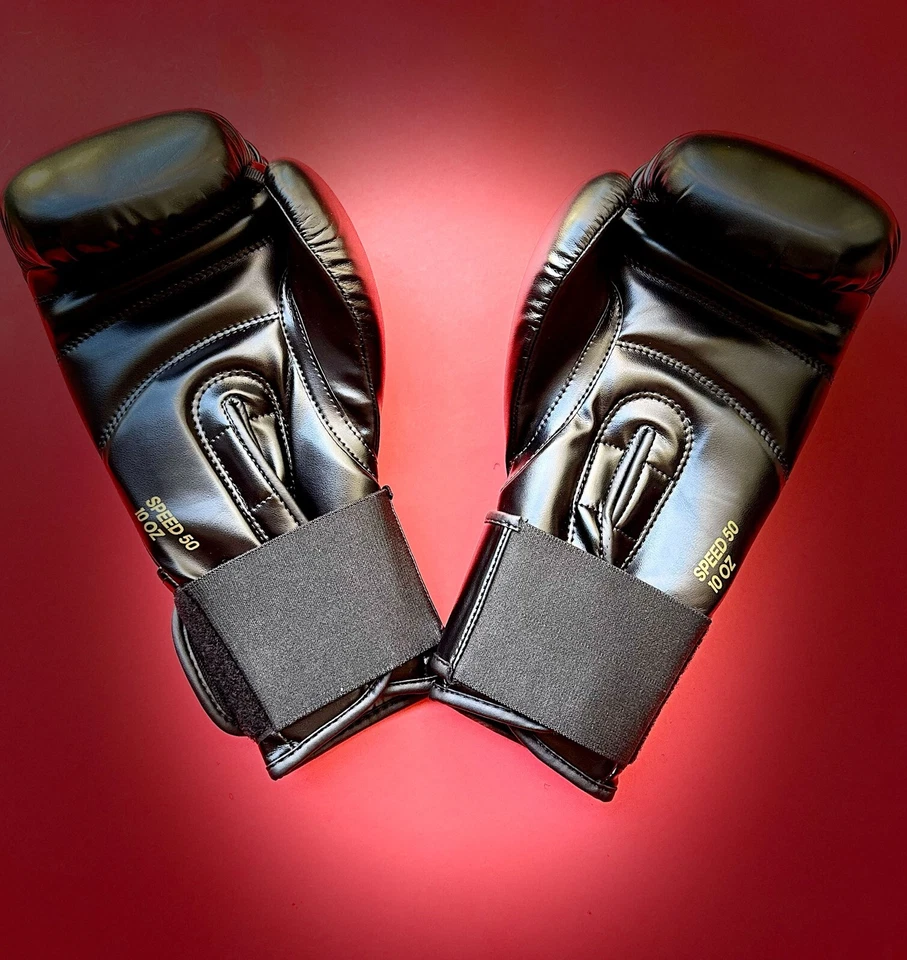 Guantes de Kickboxing de Adidas, Speed 50 Entrenamiento Boxeo, Negro/Dorado 10 OZ Foto 4 de 4