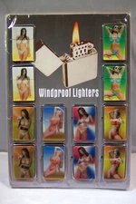 12pc LOT WINDPROOF 3D STRIPPING BIKINI FLIP TOP OIL LIGHTERS SIX DIF DISPLAY NEW
