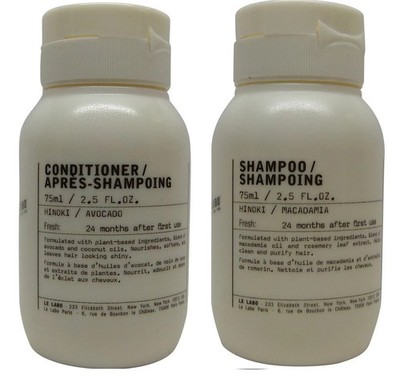 Le Labo Hinoki Shampoo & Conditioner 2.5oz bottles.