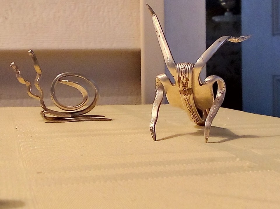 Handcrafted lucky cricket and snail figurines sculpted from actual vintage silver-plated forks — tiny, sustainable, and genuinely one-of-a-kind.