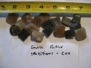 6 Small Rifle Flints and 2 Leather Flint Pads. Hand Knapped in the 1700's.