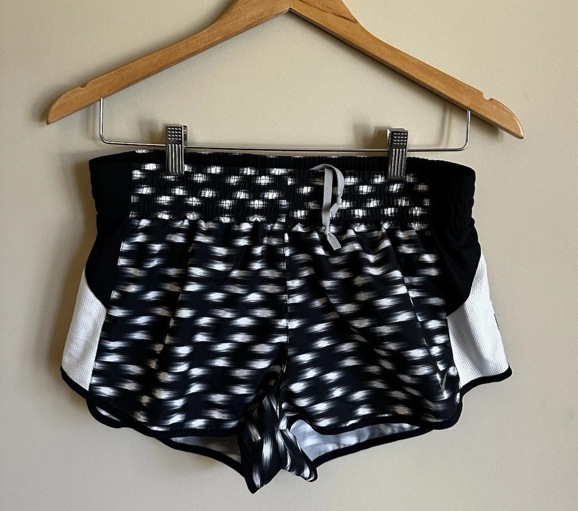 Nike Dri FIT Tempo pantaloncino running donna medio nero bianco atletico leggero