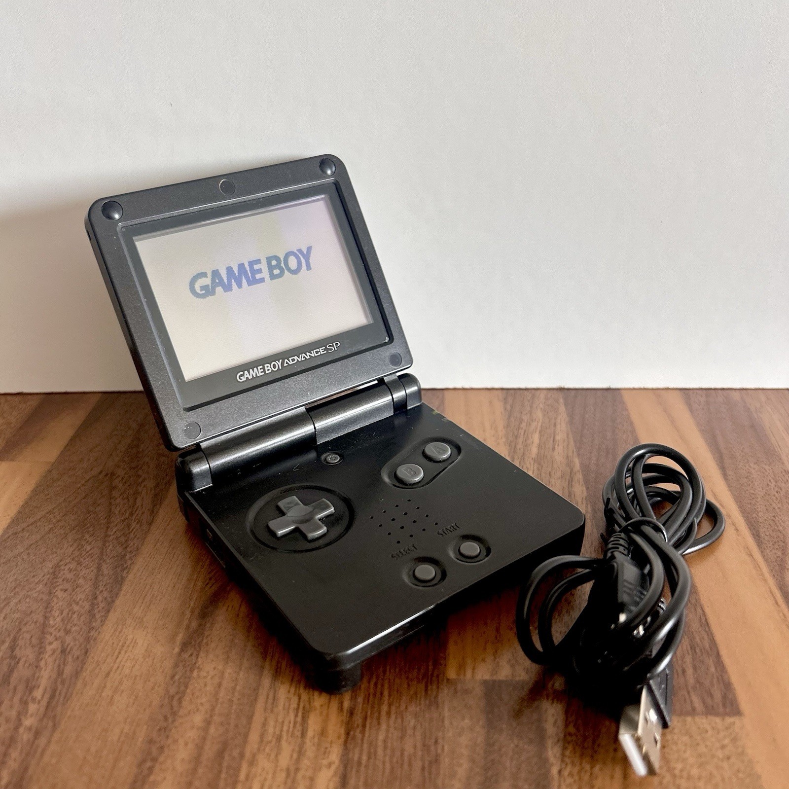 Console Nintendo Game Boy Advance SP Nero AGS 001 + Caricatore OTTIME CONDIZIONI