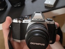 Olympus OM-D E-M10 mk1 with 4 lenses and extra batteries charger and bag