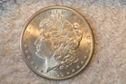 1899-S BU MORGAN DOLLAR