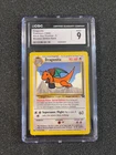 Dragonite Pokémon (1999), Black Star Promo 5 Mewtwo Strikes Back, CGC MINT 9.0