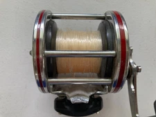 Penn Senator 3/0 special 12H, rod clamp, aluminum spool works great,clean chrome