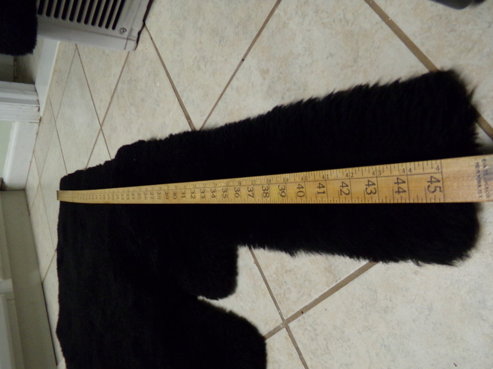 A SET OF 3 ROLLS ROYCE BLACK SHEEPSKIN OVER RUGS by PAUL BLANCHE