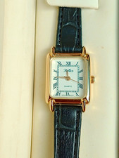 Reflex Tank Ladies Quartz Watch Rectangular Gold Tone Roman Dial Black Strap