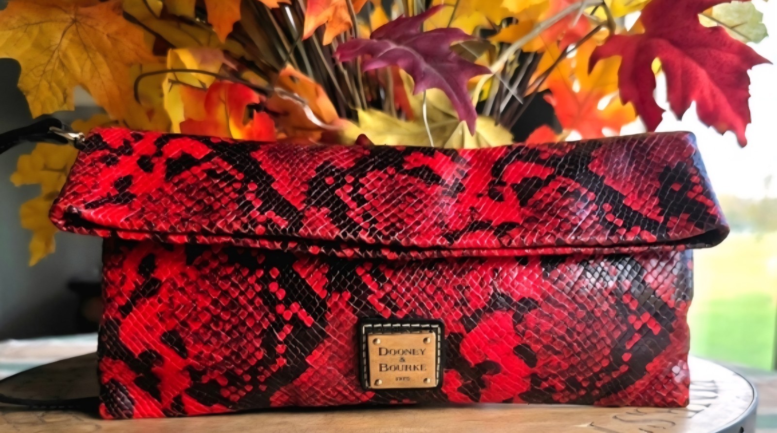 Dooney And Bourke Python Embossed Clutch - image 1