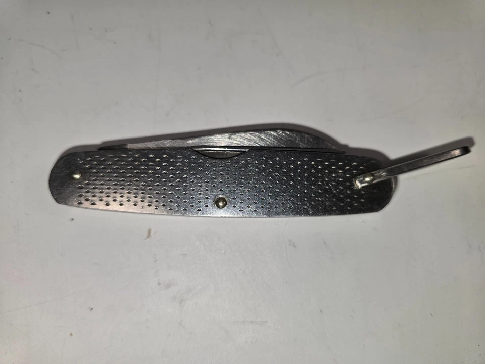 Navaja de bolsillo militar de acero inoxidable, MIL-K-818, Camillus Foto 2 de 4