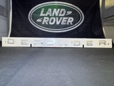Genuine Land-Rover Defender Front Silver Satin Name Plate LR130854